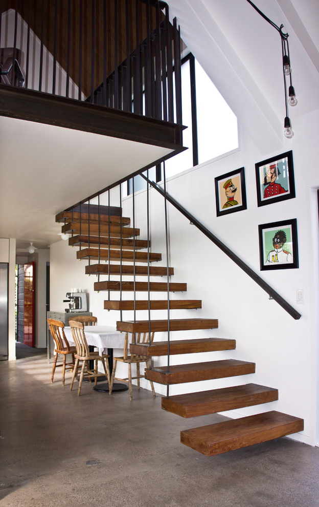 Mid-sized contemporary wood straight staircase in Auckland.