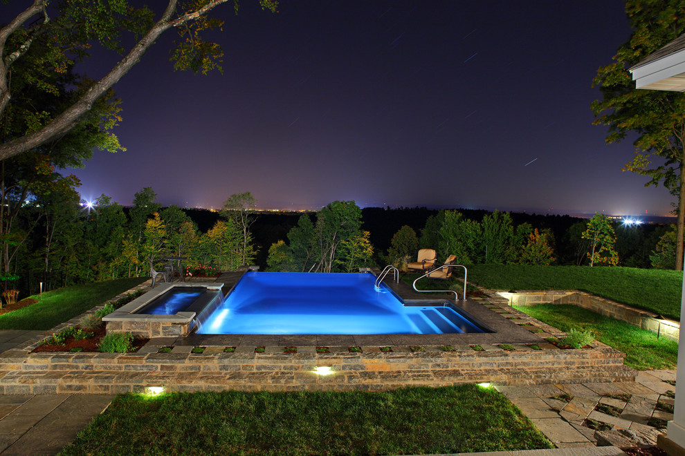 This is an example of a contemporary pool in Boston.