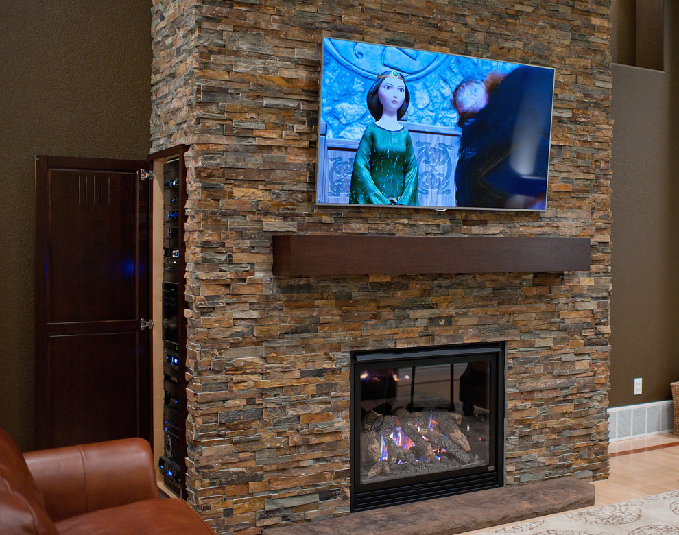 Elegant living room photo with a wall-mounted tv