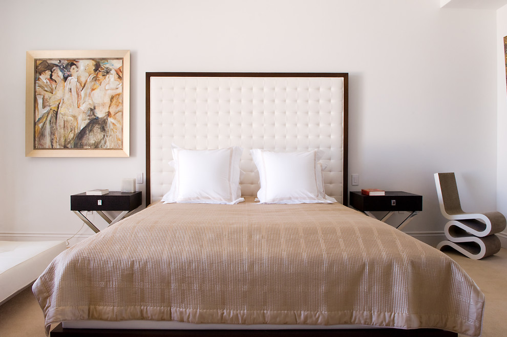 Inspiration for a contemporary bedroom remodel in New York with white walls