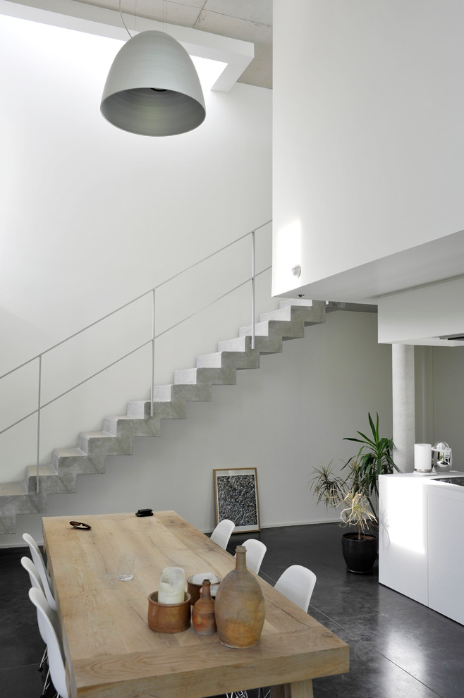 Design ideas for a large contemporary open plan dining in Lille with white walls, ceramic floors and no fireplace.