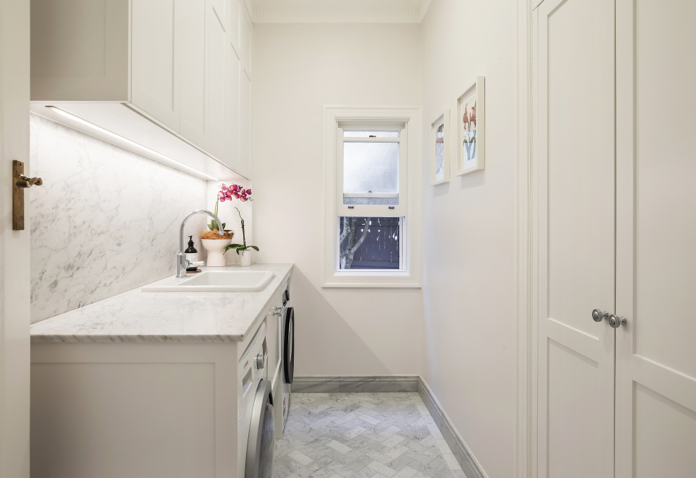 Photo of a transitional laundry room in Sydney.