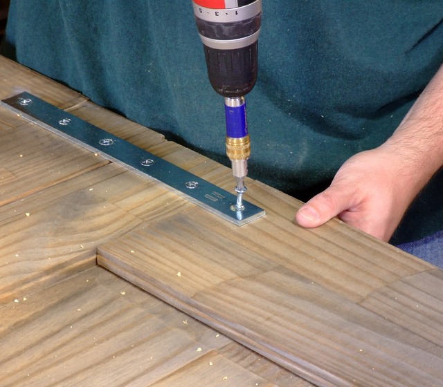 Make Your Own Rustic Chic Headboard From Salvaged Doors