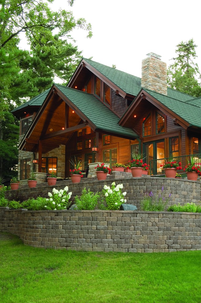 Photo of a country two-storey exterior in Minneapolis with a shingle roof.