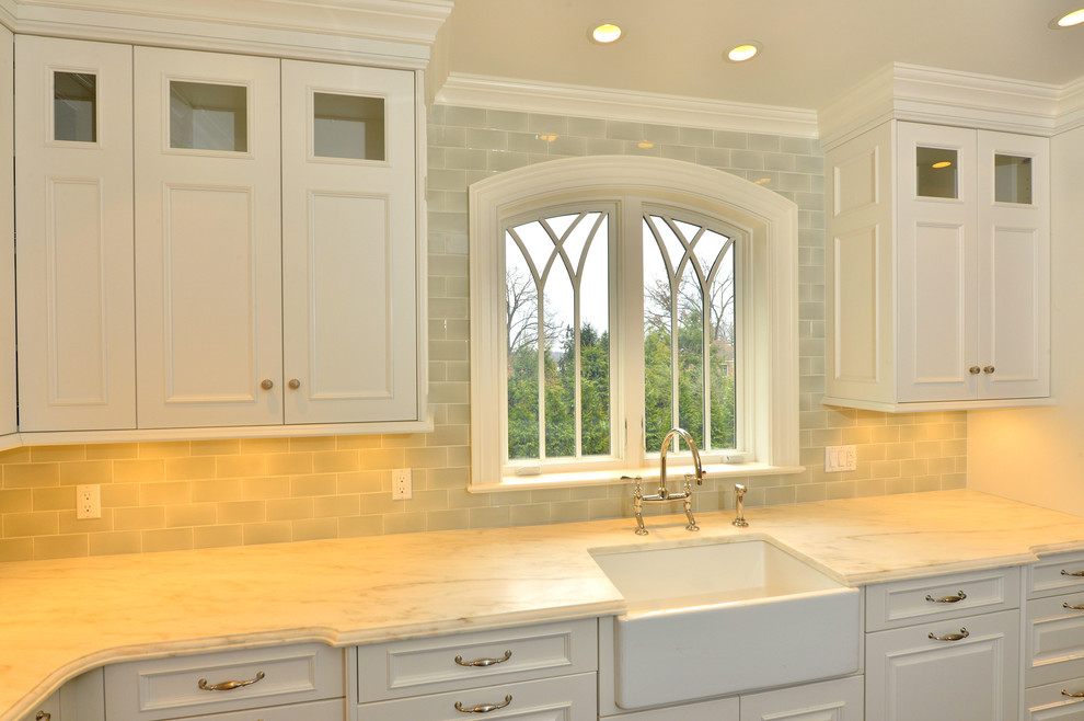 Example of a transitional kitchen design in New York