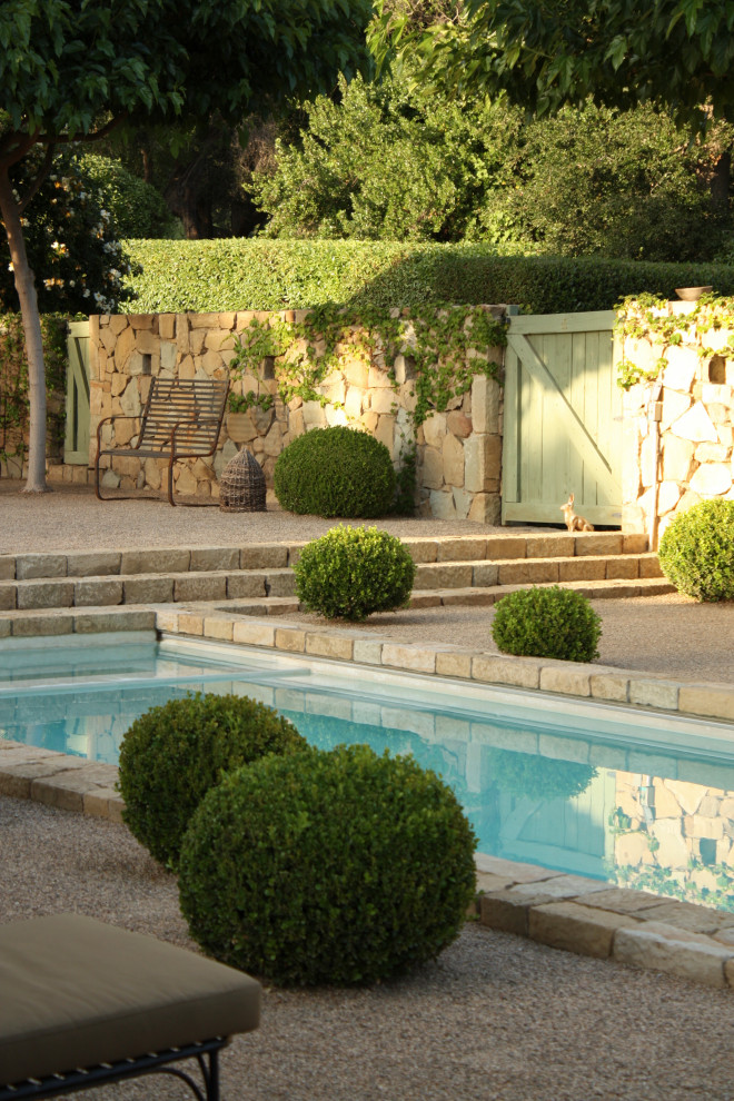 Inspiration for a mediterranean courtyard rectangular lap and privacy pool remodel