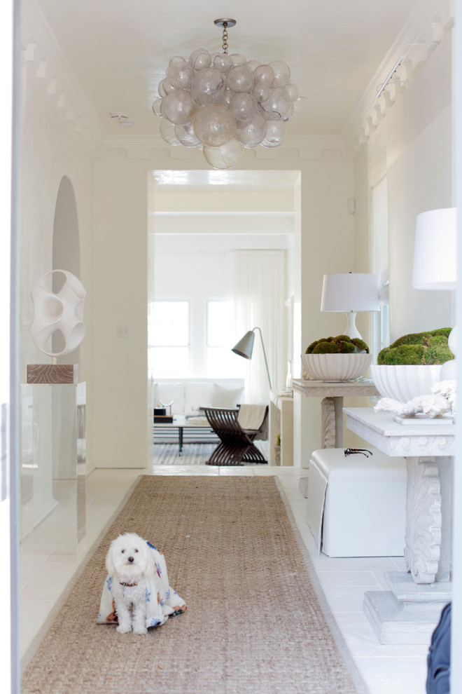 Design ideas for a beach style entryway in Atlanta with beige walls.