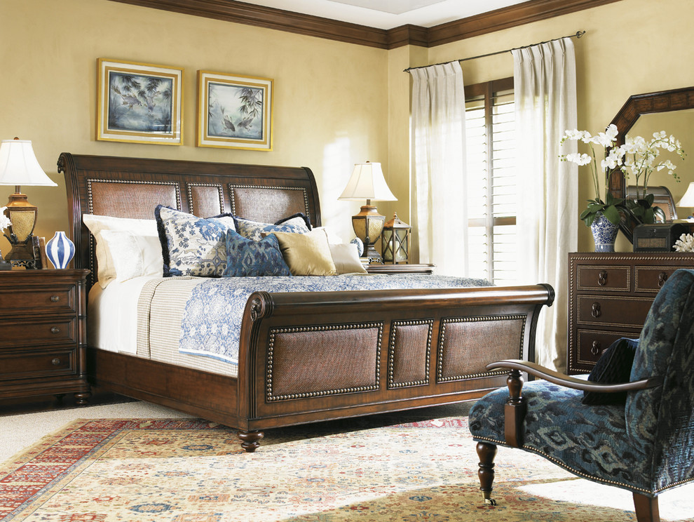 Inspiration for a large traditional bedroom in Orange County with yellow walls, carpet and no fireplace.