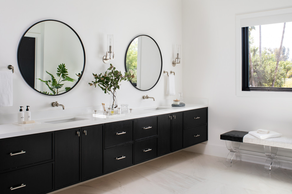 Design ideas for an expansive contemporary bathroom in Los Angeles with recessed-panel cabinets, black cabinets, a one-piece toilet, white walls, marble floors, an undermount sink, engineered quartz benchtops, multi-coloured floor, white benchtops, a double vanity and a floating vanity.