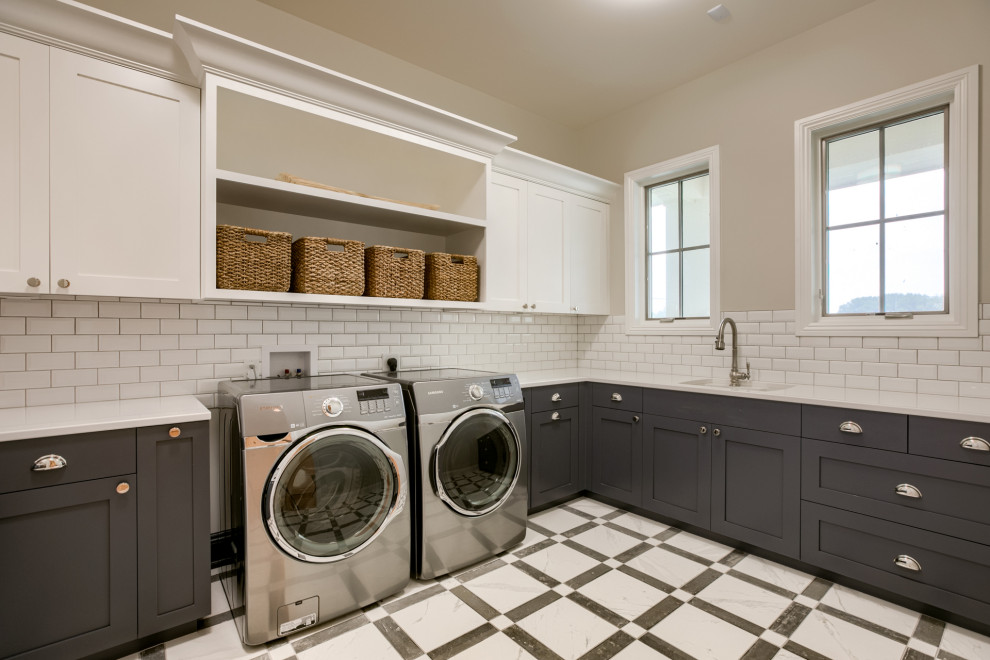 Transitional laundry room in Omaha.