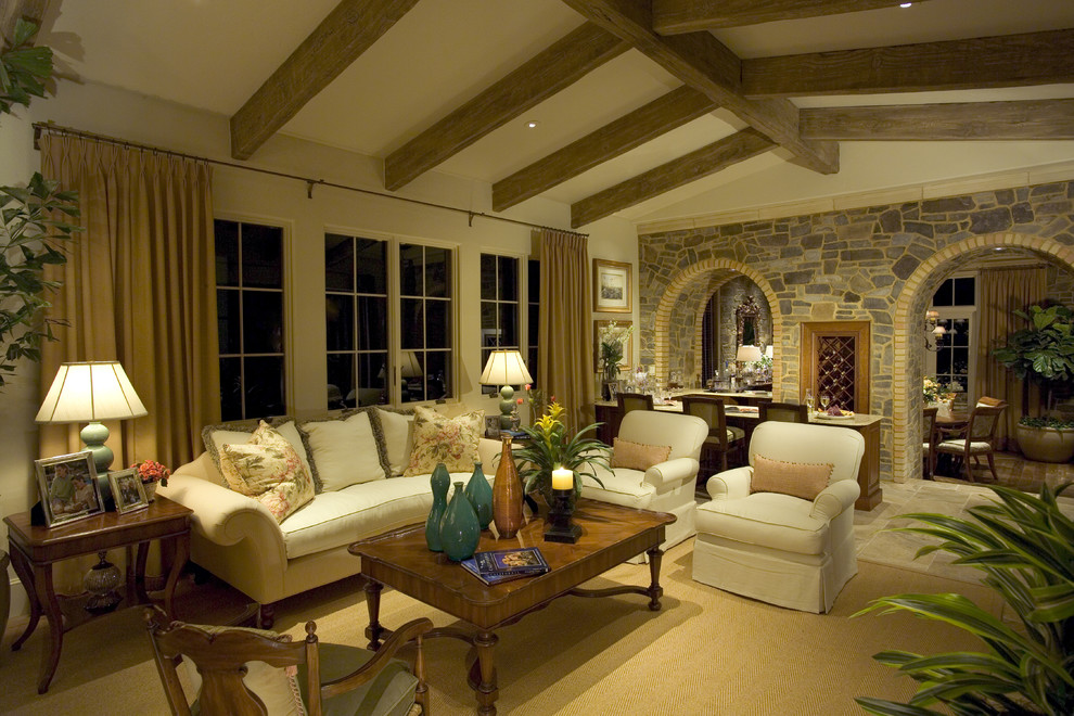 Example of a tuscan living room design in Other