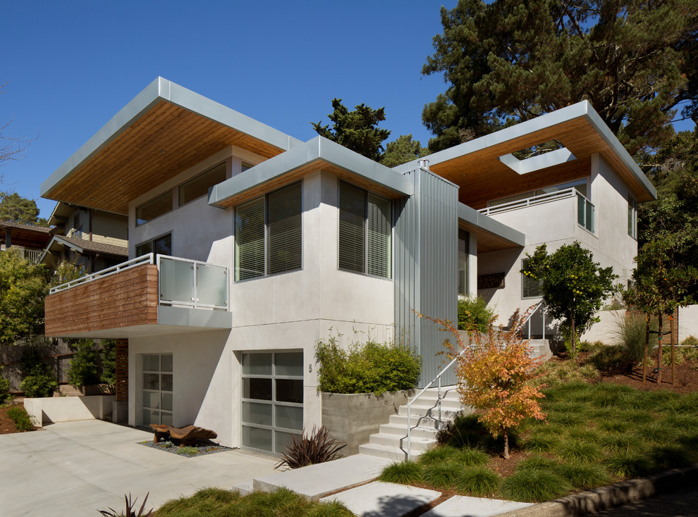 Mid-sized contemporary three-storey stucco white exterior in San Francisco.