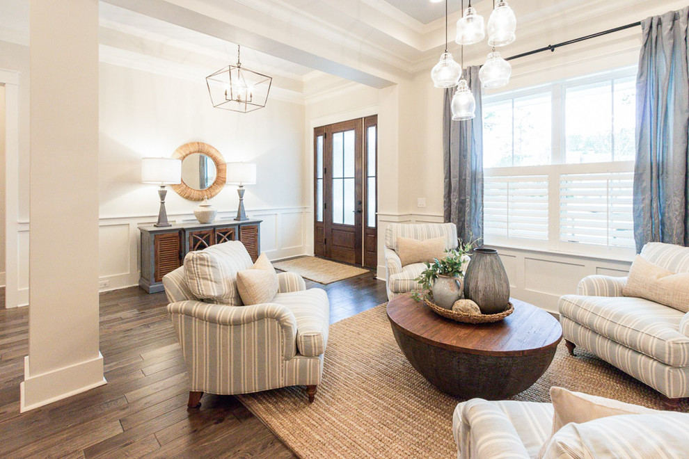 Mid-sized country formal open concept living room in Atlanta with white walls, dark hardwood floors, no fireplace and brown floor.
