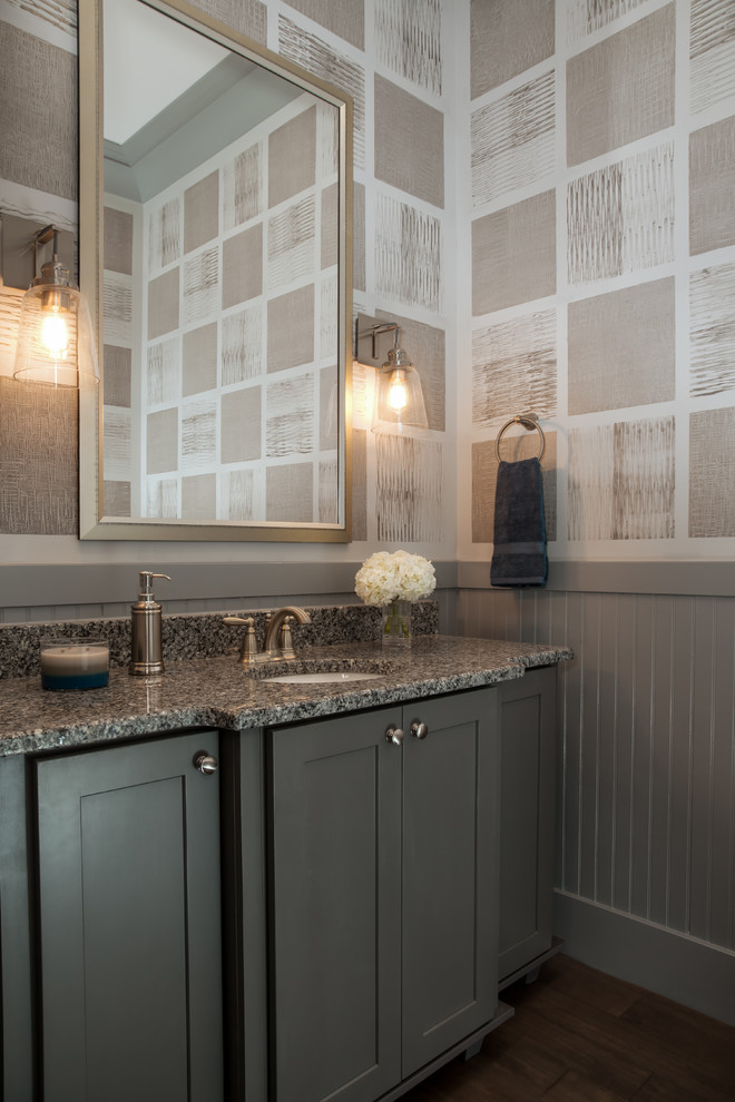 Photo of a transitional powder room in Charlotte with an undermount sink, shaker cabinets, grey cabinets and grey walls.
