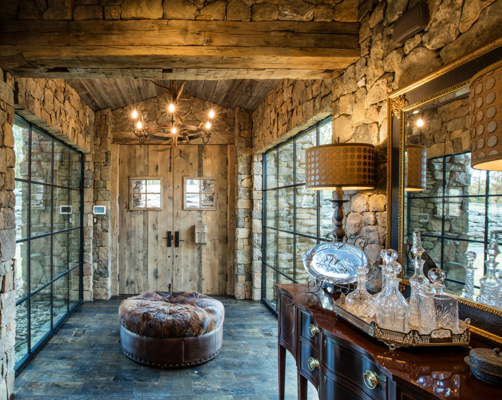 Inspiration for a rustic entryway remodel in Austin