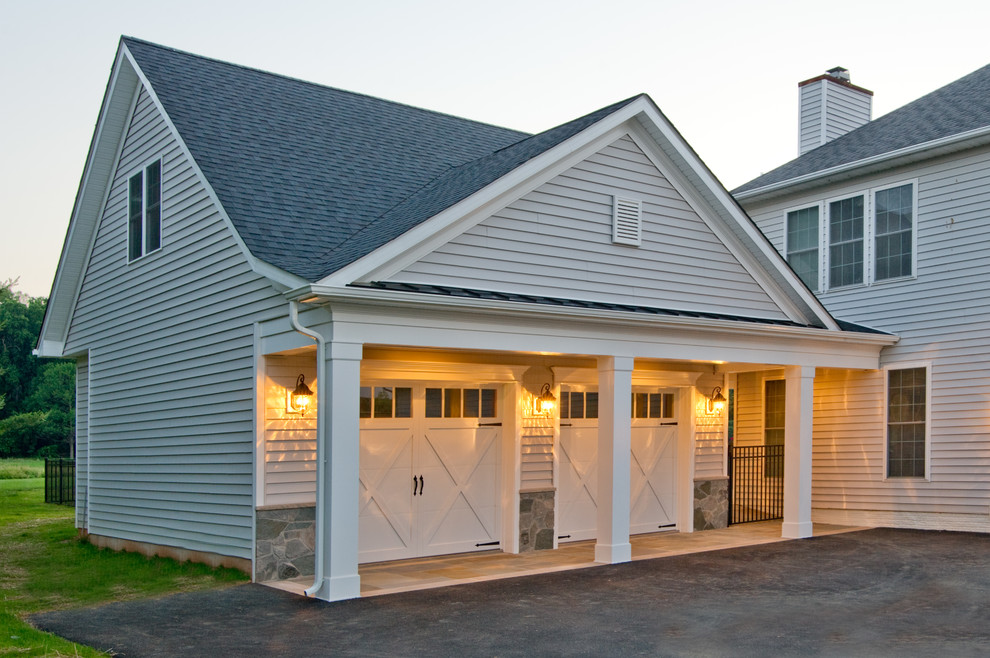 Mid-sized arts and crafts attached two-car garage photo in Baltimore