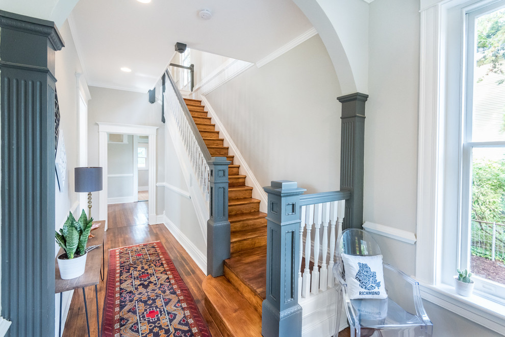 Photo of a traditional wood straight staircase in Richmond with wood risers.