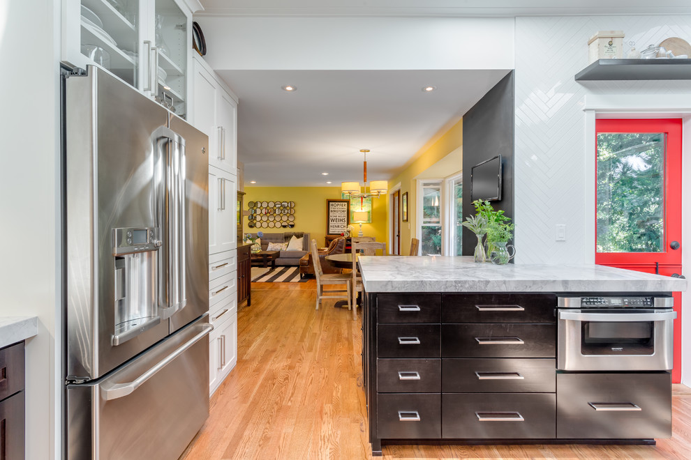 Example of a transitional kitchen design in Seattle