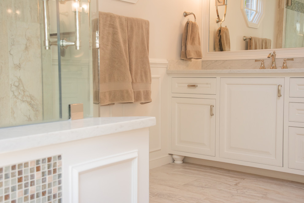 Inspiration for a mid-sized transitional master single-sink bathroom remodel in Baltimore with recessed-panel cabinets, white cabinets, quartz countertops, white countertops and a built-in vanity