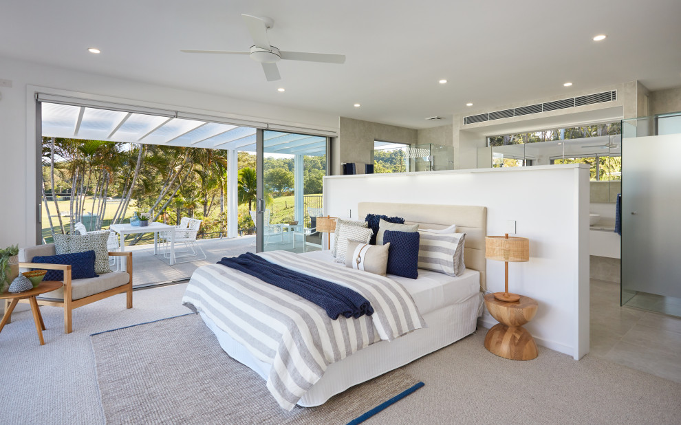 Design ideas for a contemporary master bedroom in Gold Coast - Tweed with white walls, carpet, no fireplace and beige floor.