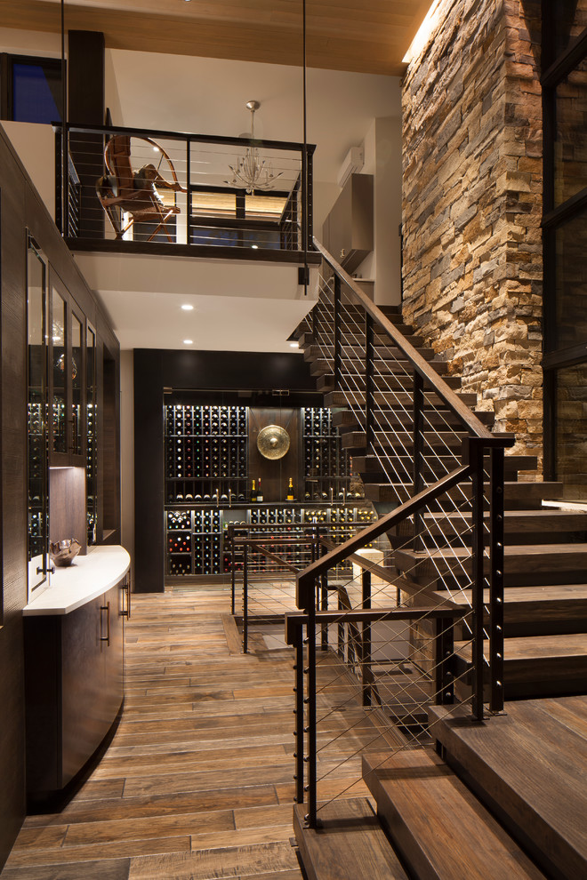Inspiration for a mid-sized country wood l-shaped staircase in Denver with wood risers and cable railing.