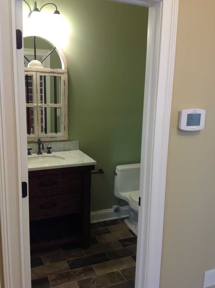 Photo of a transitional powder room in Chicago.