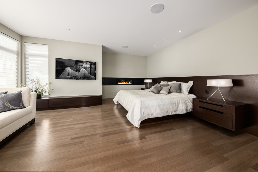 This is an example of a contemporary bedroom in Ottawa.