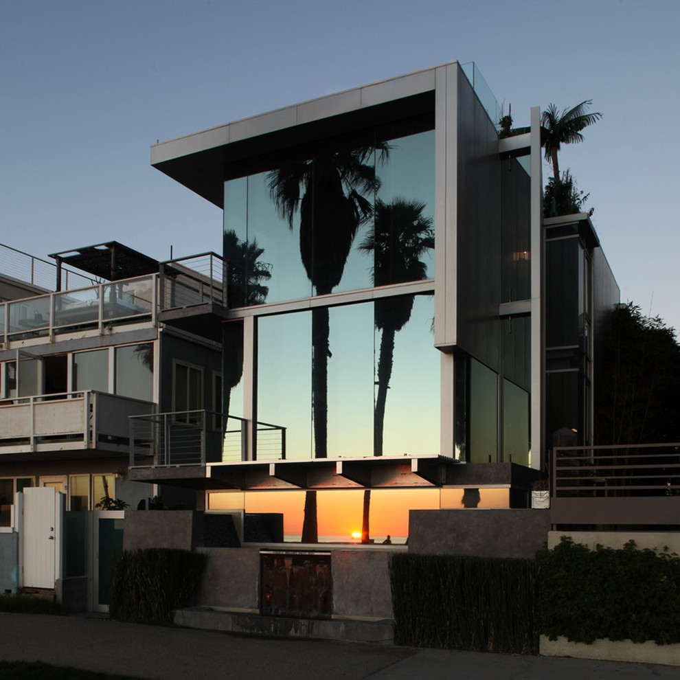 Inspiration for a contemporary two-storey glass exterior in Los Angeles.