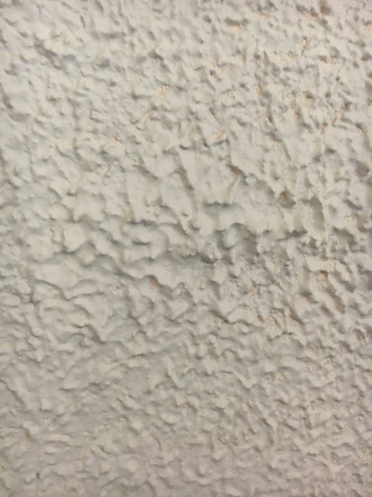 Help with ugly Popcorn textured paint on walls