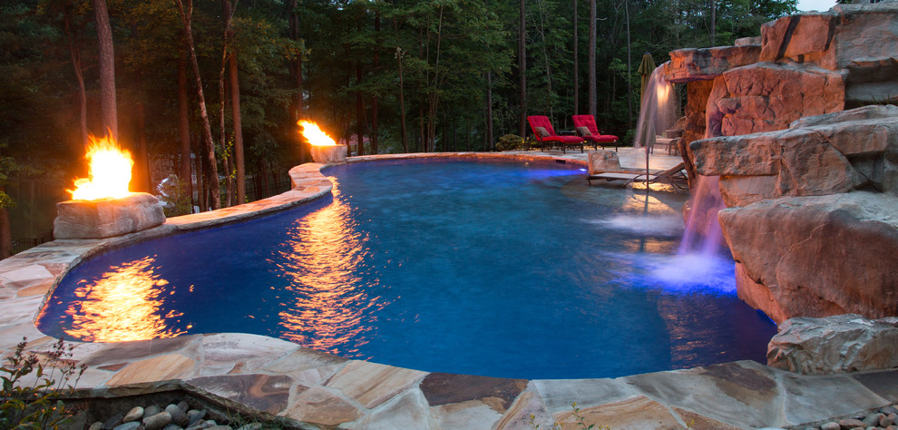Inspiration for a rustic pool remodel in Charlotte