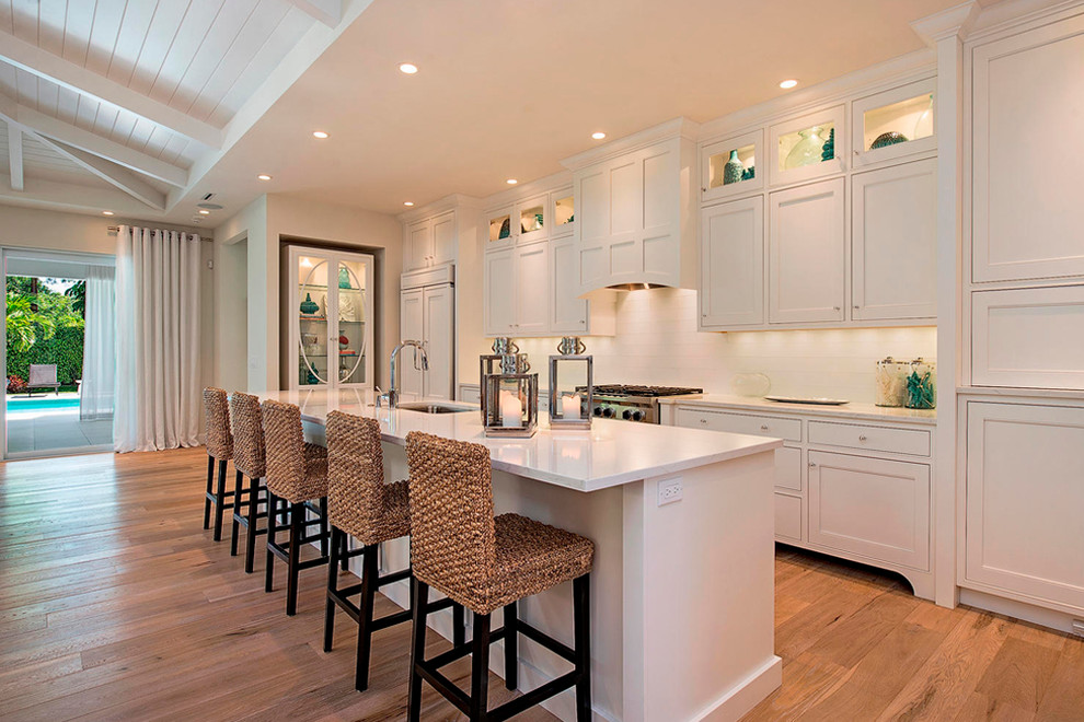 Design ideas for a mid-sized transitional kitchen in Charleston with beaded inset cabinets and with island.