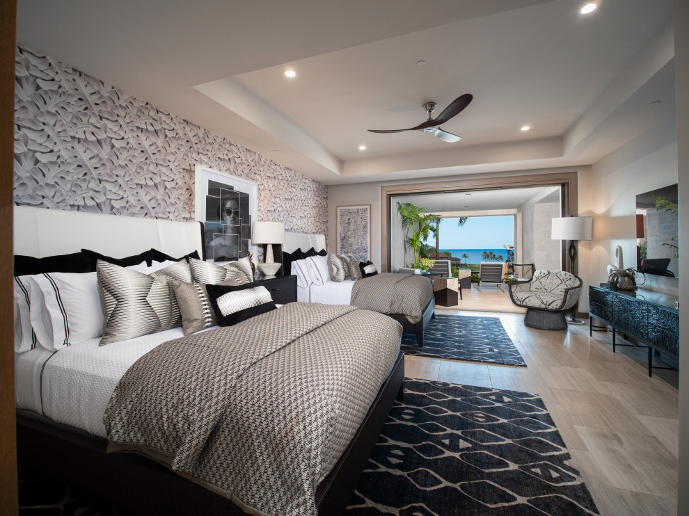 Inspiration for a large contemporary master bedroom in Hawaii with white walls, travertine flooring, beige floors, a coffered ceiling and wallpapered walls.