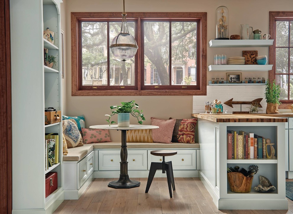 Inspiration for a transitional kitchen in Houston with green cabinets.