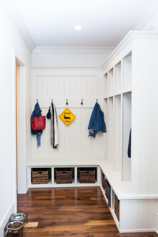 Inspiration for a country mudroom in Atlanta with white walls and dark hardwood floors.