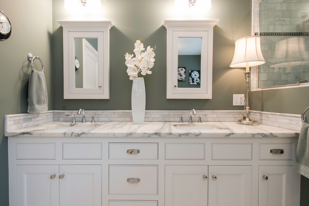 Design ideas for a mid-sized arts and crafts master bathroom in Minneapolis with flat-panel cabinets.
