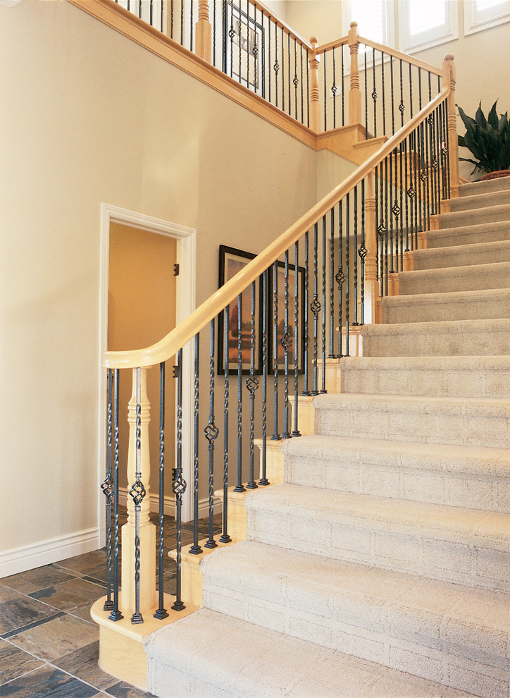 Inspiration for a mid-sized traditional carpeted l-shaped staircase in San Francisco with carpet risers.