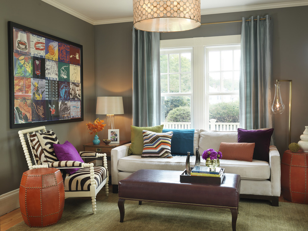 This is an example of a contemporary living room in Boston with grey walls, carpet, no fireplace and no tv.