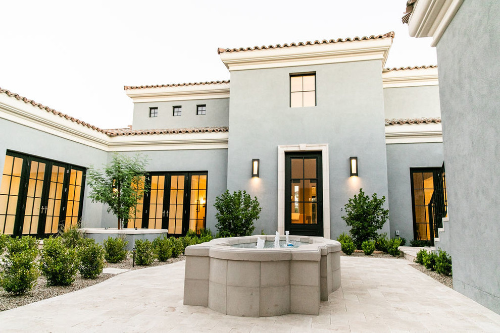 Example of a transitional exterior home design in Phoenix