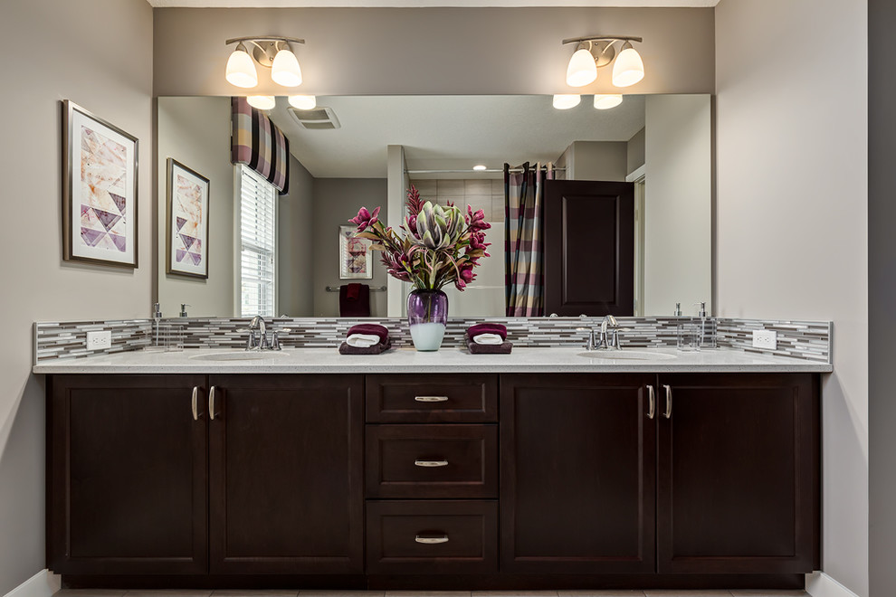 Example of a transitional bathroom design in Calgary
