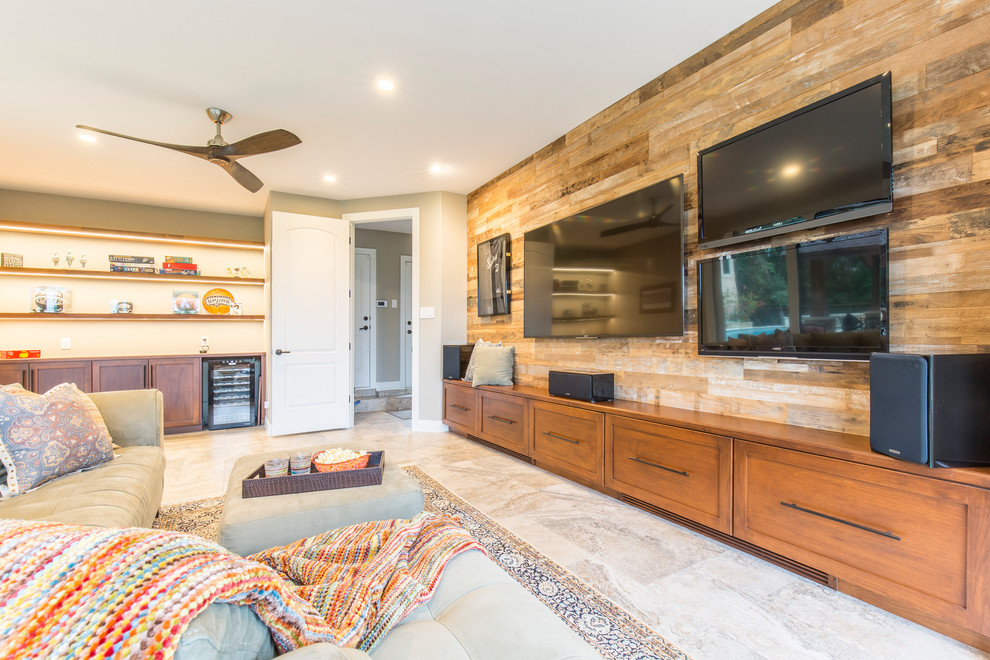 This is an example of a transitional home theatre in Austin with brown walls, a wall-mounted tv and grey floor.