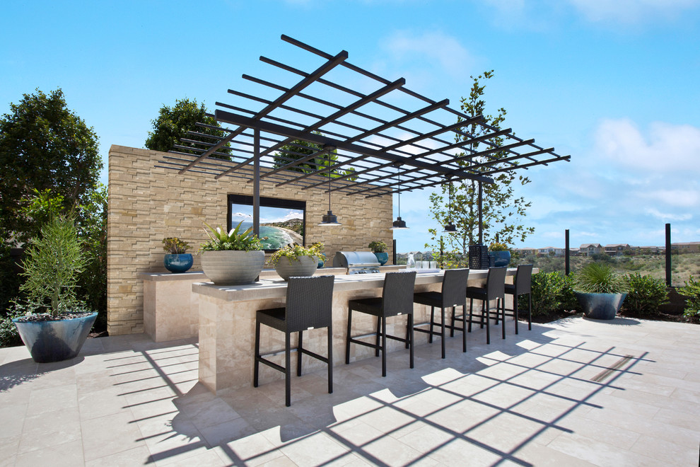 Design ideas for a transitional patio in Orange County with a pergola.