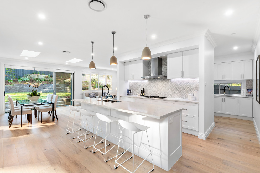 Design ideas for a transitional kitchen in Sydney.