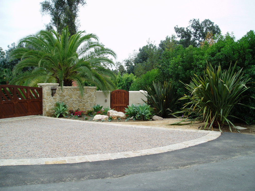 Example of a tuscan home design design in San Diego