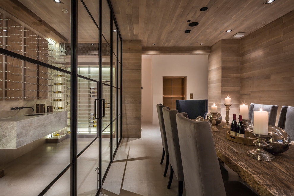 Example of a large trendy beige floor wine cellar design in San Francisco with storage racks