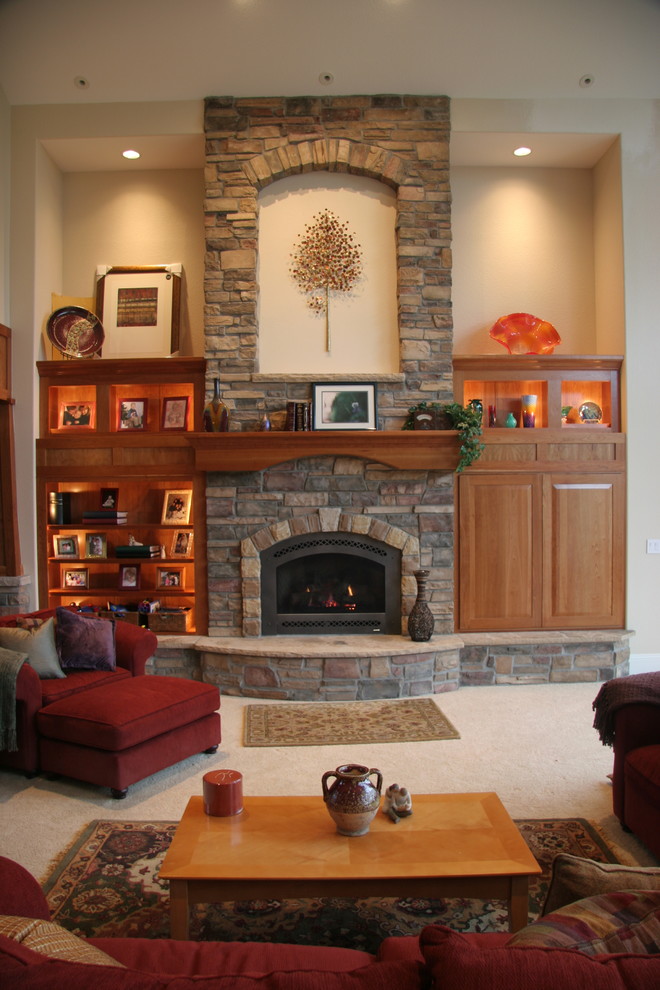 Design ideas for a mid-sized arts and crafts formal enclosed living room in Denver with beige walls, carpet, a standard fireplace, a stone fireplace surround and no tv.