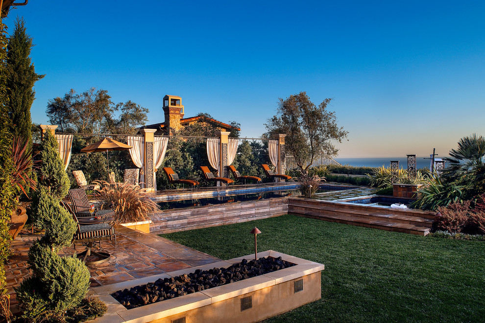 Tuscan home design photo in Orange County