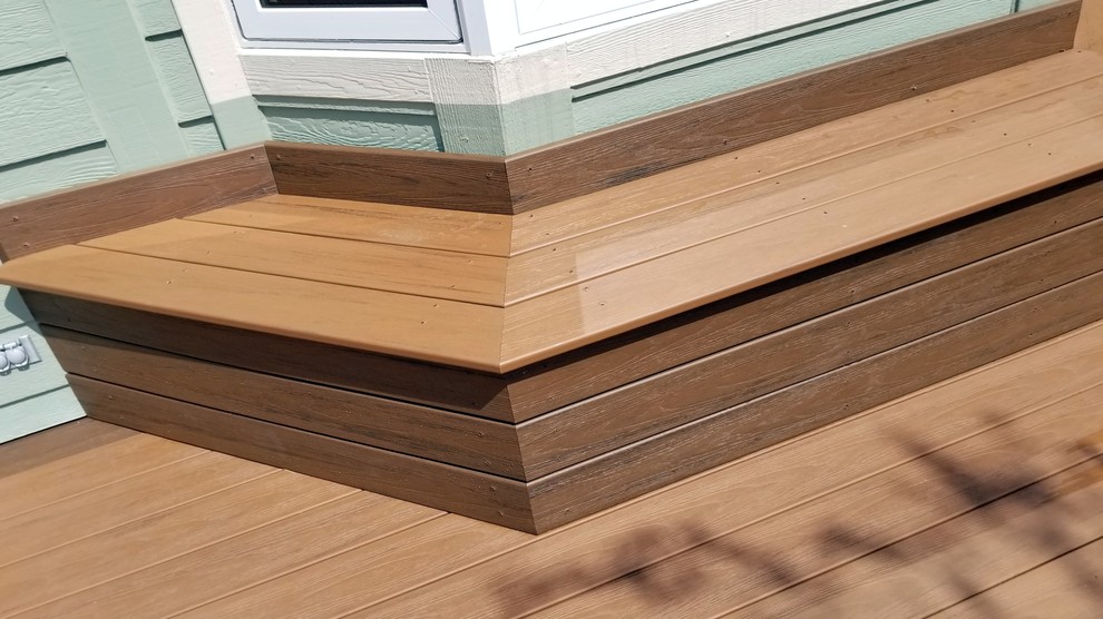 Inspiration for a large backyard deck remodel with no cover