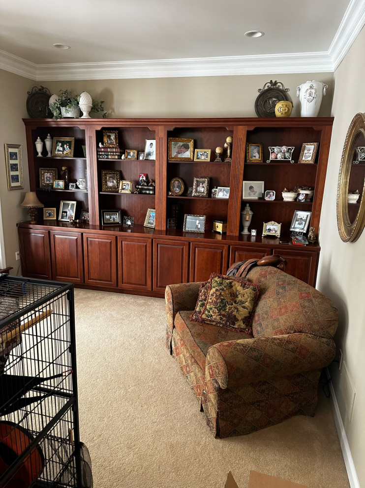 Decorating a dark cherry bookcase wall