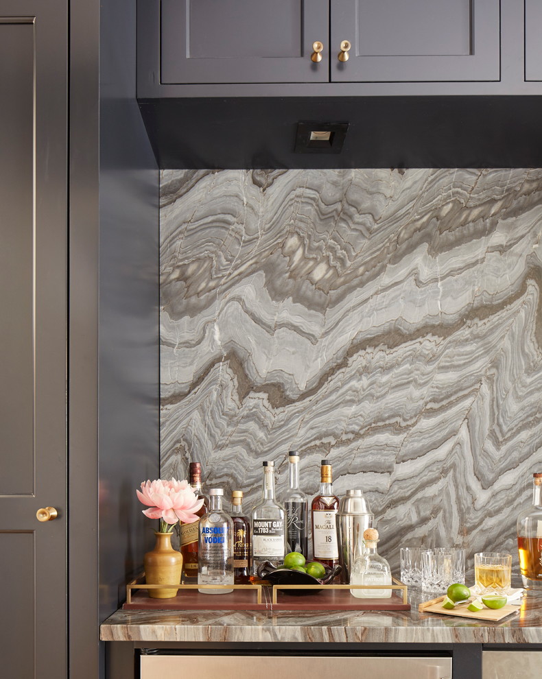 Mid-sized single-wall home bar in Jacksonville with beaded inset cabinets, grey cabinets, quartzite benchtops, grey splashback and stone slab splashback.