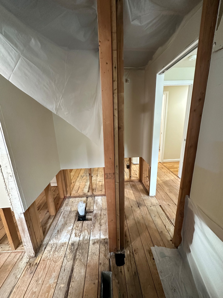 A bedroom closet and hall bath combined